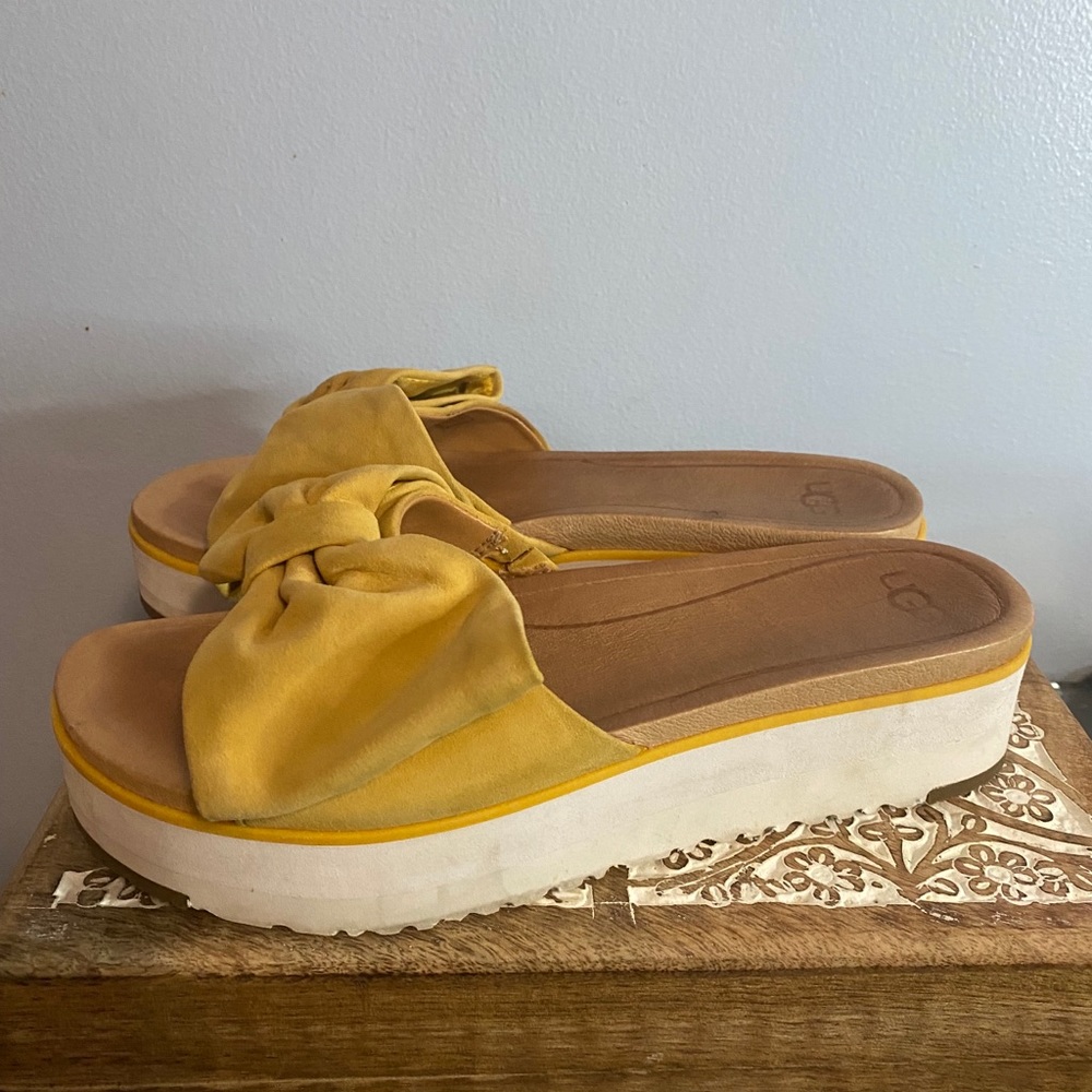 UGG bow platform sandals.